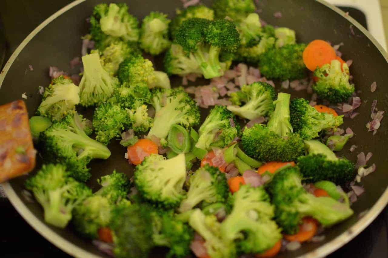 Sauteed Vegetables - Broccoli, onions and carrots in a pan