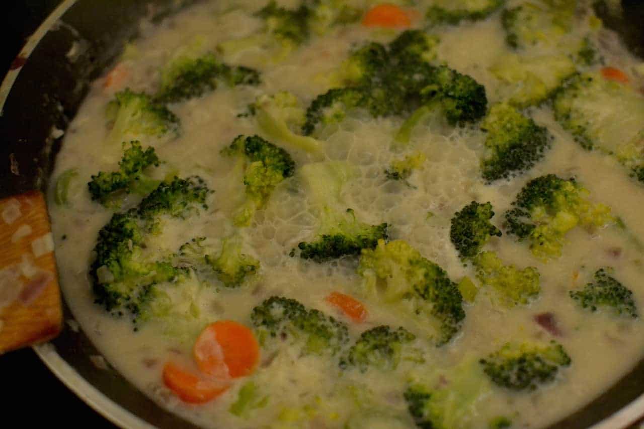 Sauteed broccoli, onions and Carrots in a coconut pan cooked in pan