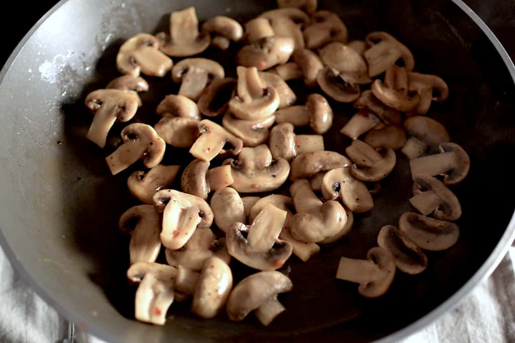 Sauteed Mushrooms in a heating pan