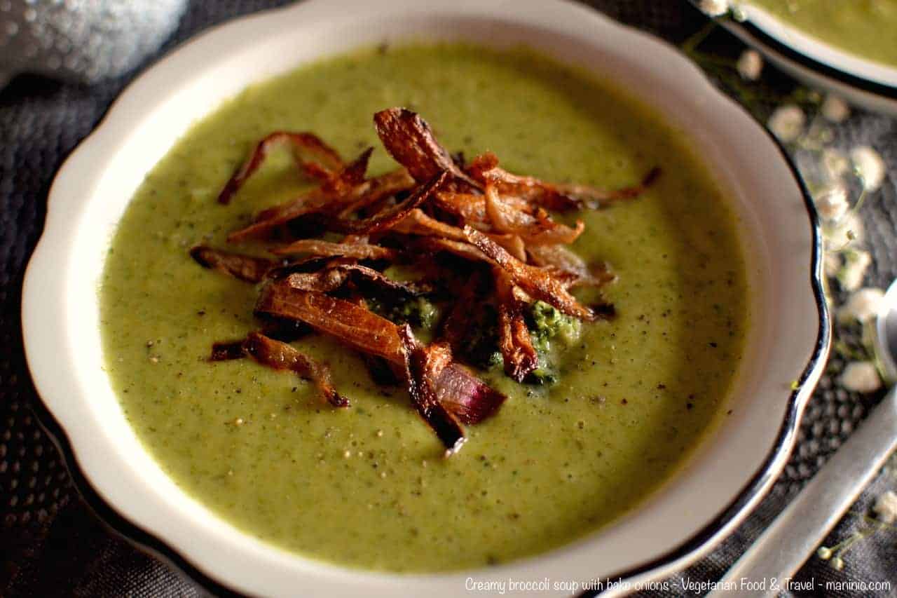 Vegan Broccoli Soup served with glilled onions, in a white plate