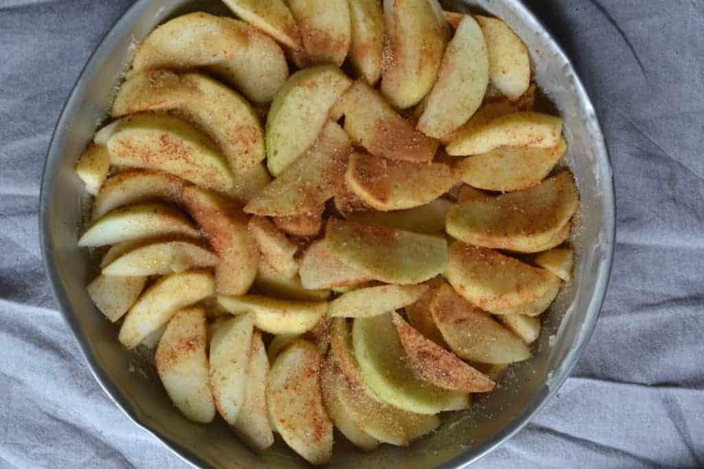 Apple with a cinnamon in a pan