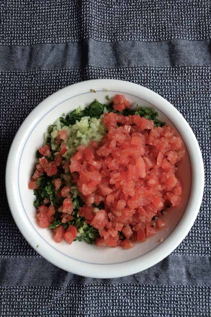 Chopped vegetables in a white plate