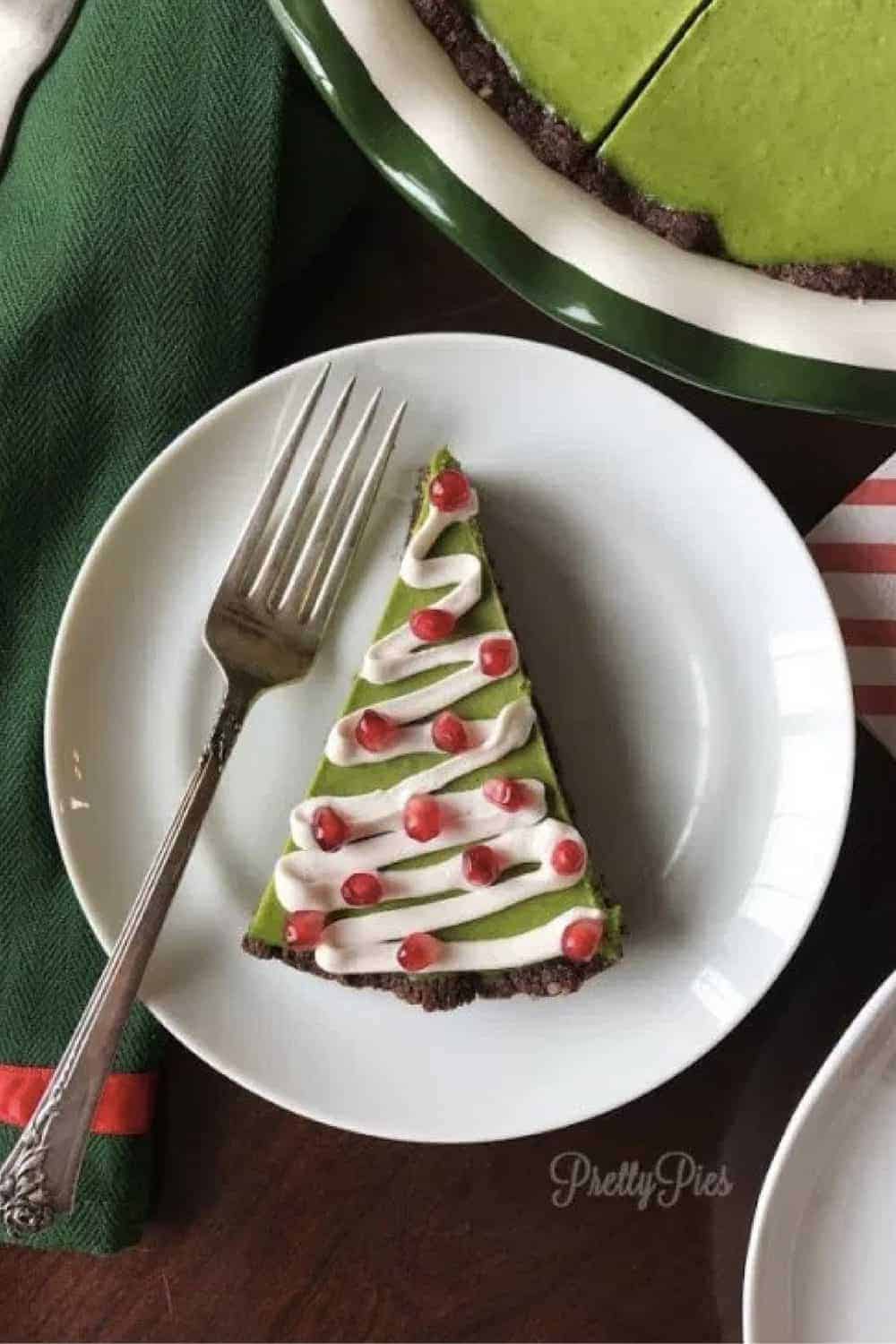 A piece of Christmas Tree cake with a fork