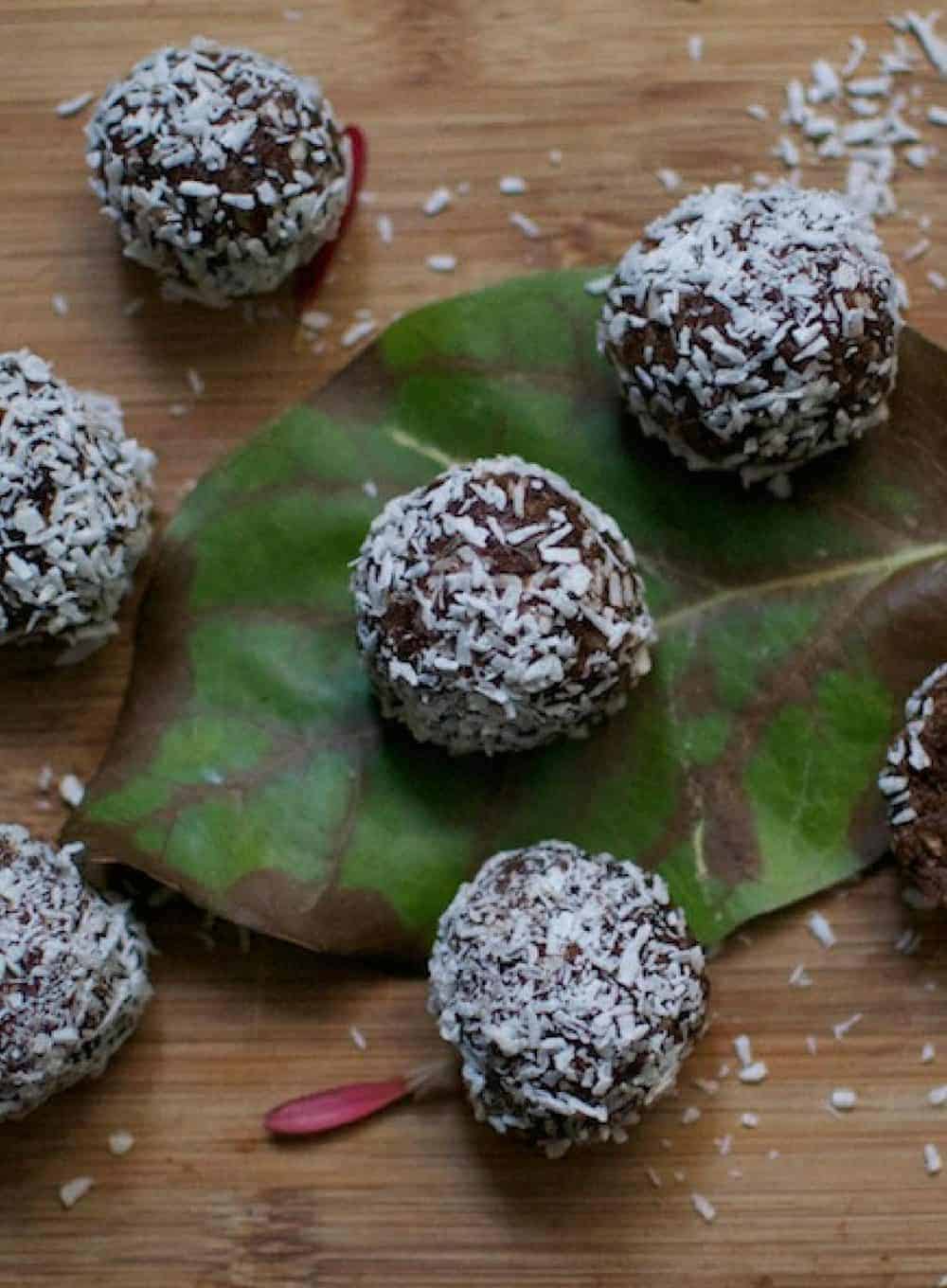 Chocolate Truffles for Christmas with coconut in a green leag