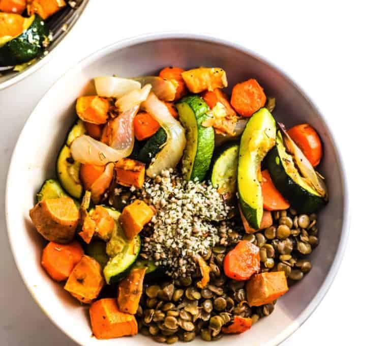 Roasted Vegetable Lentil Salad in a white plate - - Vegan Easter Recipes