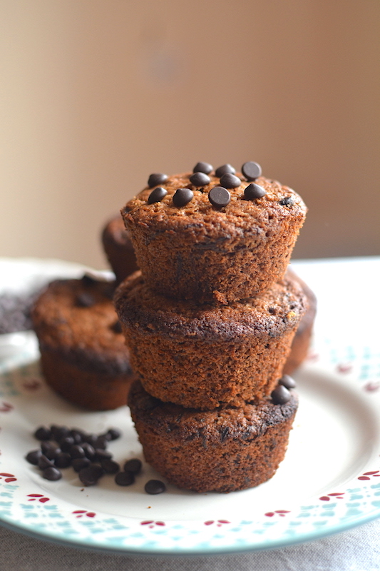 3 muffins one top of each other with chocolate
