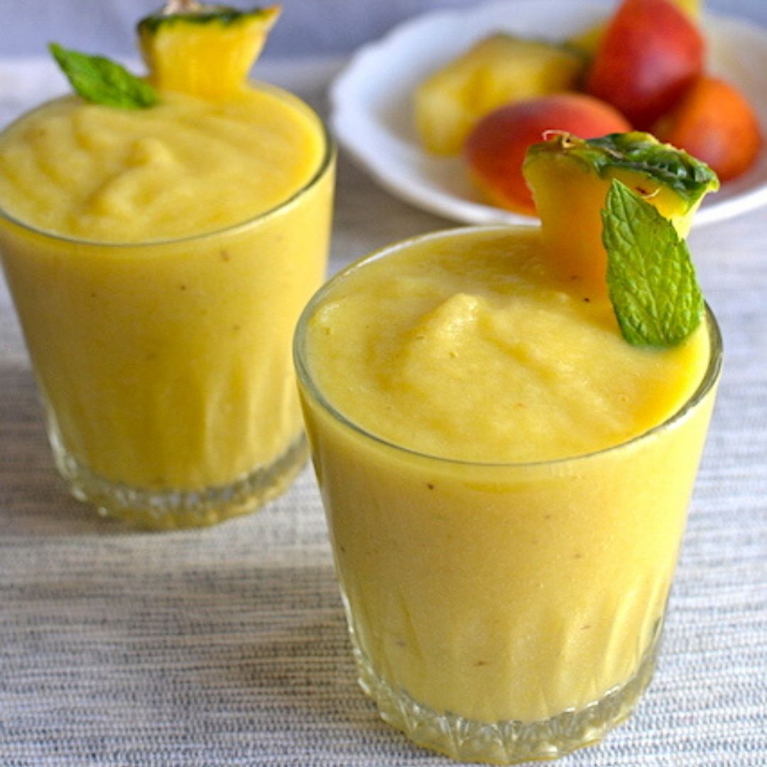 tropical smoothie with mint in glasses