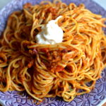 Pasta recipe with cream in a purple plate
