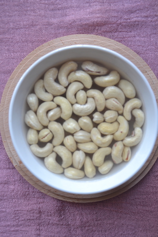 cashews in a bowl with water