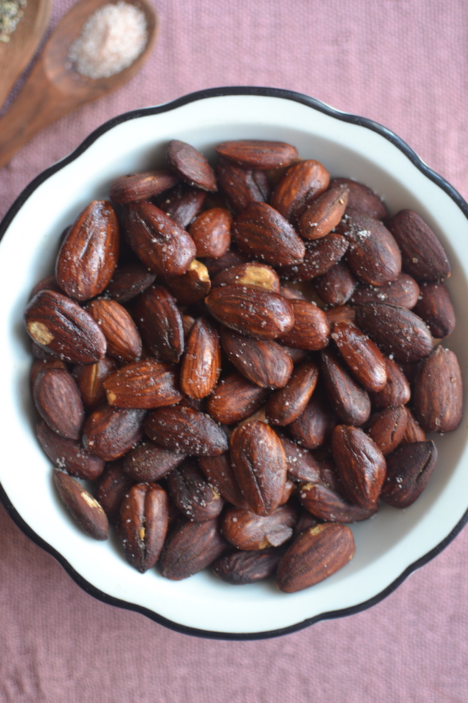 roasted almonds in white plate 