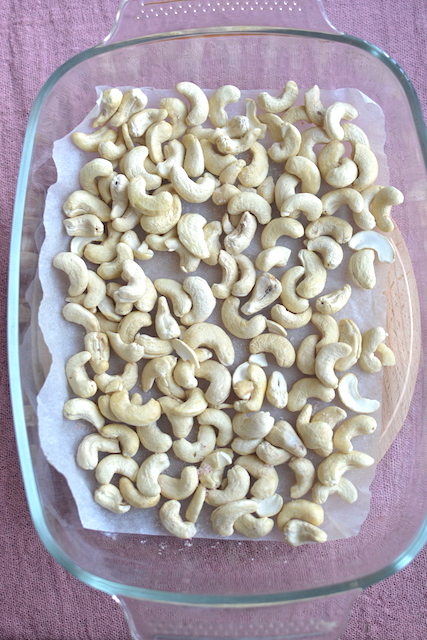 cashews in a baking pan
