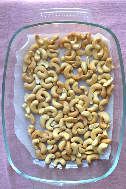 baked cashews in a pan